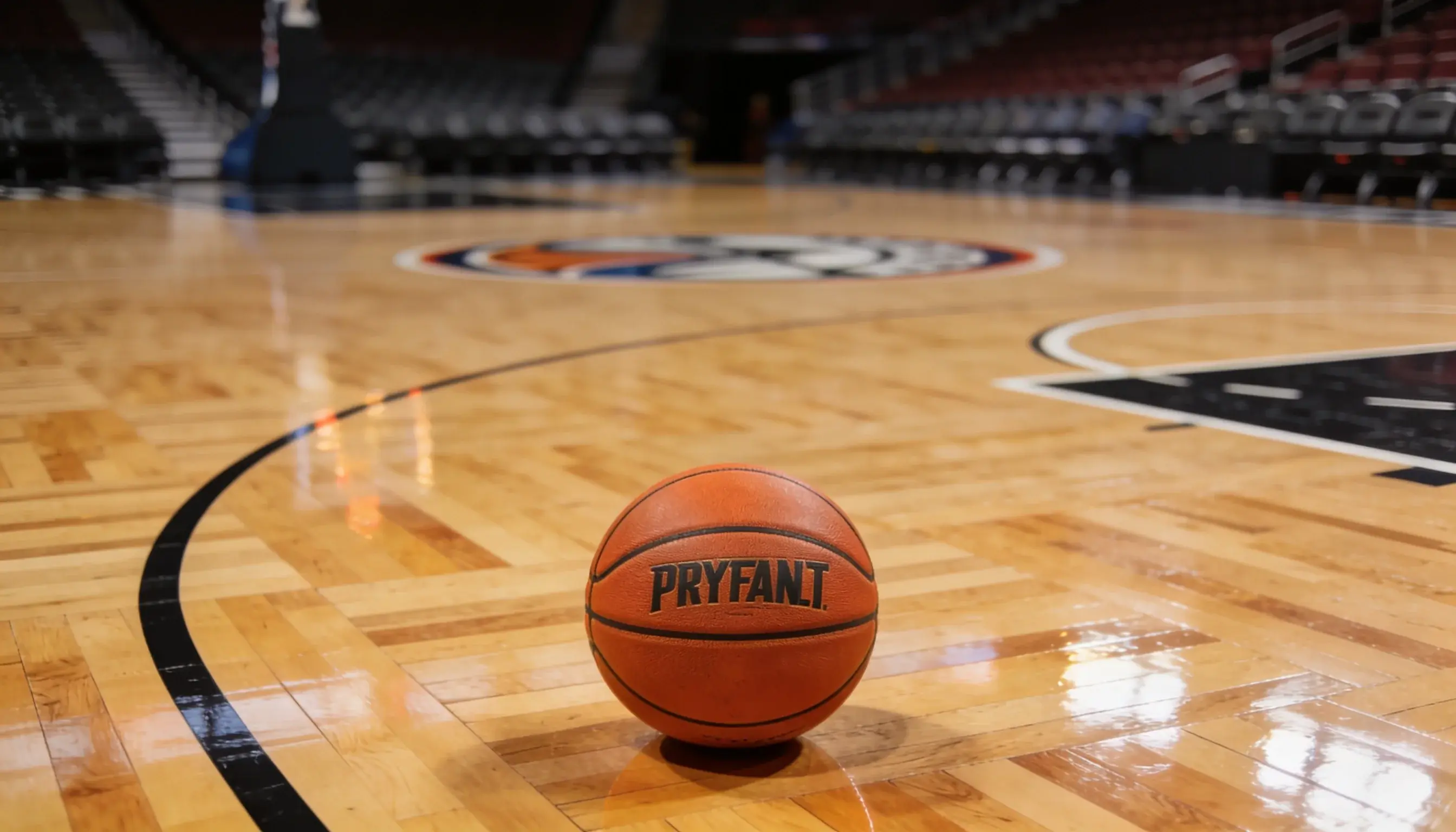 NBA basketball resting on the parquet floor of a playoff arena before tip-off